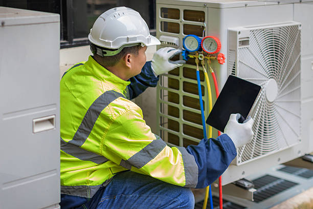 Professional Air Conditioning Repair technician working in Kohler, WI